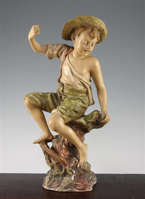 A late 19th century Goldscheider cold painted terracotta figure of fisherboy, modelled by Leroinbourg, 43.5cm